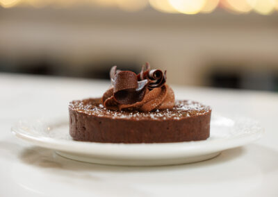 Chocolate cake on a white plate