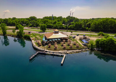 Zoomed out Quarry Restaurant drone image with trees