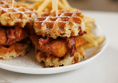 close up Chicken and Waffles with fries