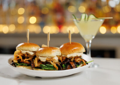 Sliders at the bar with cucumber martini