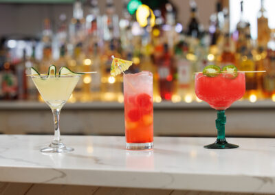 Summer drinks lined up at the bar